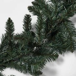 9' Battery Operated Pre-Lit Artificial Pine Christmas Garland Green with Dual Color LED Lights - Wondershop™