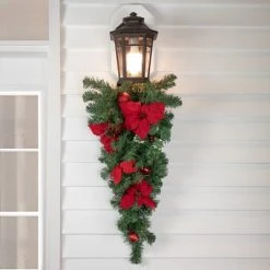Northlight 32" Red Poinsettia Pine Cone and Ball Artificial Christmas Teardrop Swag, Unlit