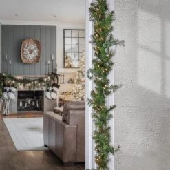 National Tree Company First Traditions Pre-Lit Christmas North Conway Garland with Pinecones, Warm White LED Lights, Battery Operated, 9 ft