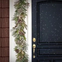 HGTV Home Collection 6ft Pre Lit Artificial Christmas Garland, Mixed Branch Tips , Decorated with Pinecones, Berries, Snowflakes, and Ornaments