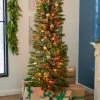 Home Heritage Pre-Lit Skinny Artificial Pine Christmas Tree with Lights and Foldable Stand -Northlight Christmas Store GUEST 998ea7f3 cfbe 43ae 85d3 4b6de7d14b48