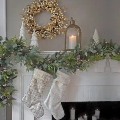 National Tree Company HGTV Home Collection 9ft Pre-Lit Winter Garden Artificial Garland with Pinecones and Fern Fronds, Green -Northlight Christmas Store GUEST caaa0151 f44c 4662 bd17 5a6f87f85588