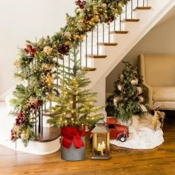 LuxenHome 3.5ft Pre-Lit LED Artificial Fir Christmas Tree with Metal Pot and Red Ribbon