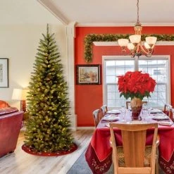 National Tree Company 6 ft Artificial Pre-Lit Slim Christmas Tree, Green, Kingswood Fir, White Lights, Includes Stand