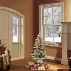 4.5ft Pre-Lit Potted Flocked Scandinavian Fir Artificial Christmas Tree - Puleo