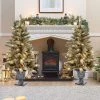 LuxenHome Set of 2 4Ft Pre-Lit LED Artificial Flocked Pine Christmas Tree with Pine Cones and Urn Pot -Northlight Christmas Store GUEST f511e68a 030b 4da9 9116 59436e312ac4