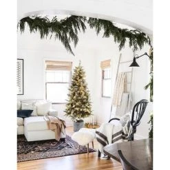 LuxenHome 5.6Ft Pre-Lit LED Artificial Slim Fir Christmas Tree with Pot -Northlight Christmas Store GUEST f8560ab1 ca02 4d47 9d65 2ae3dace6997